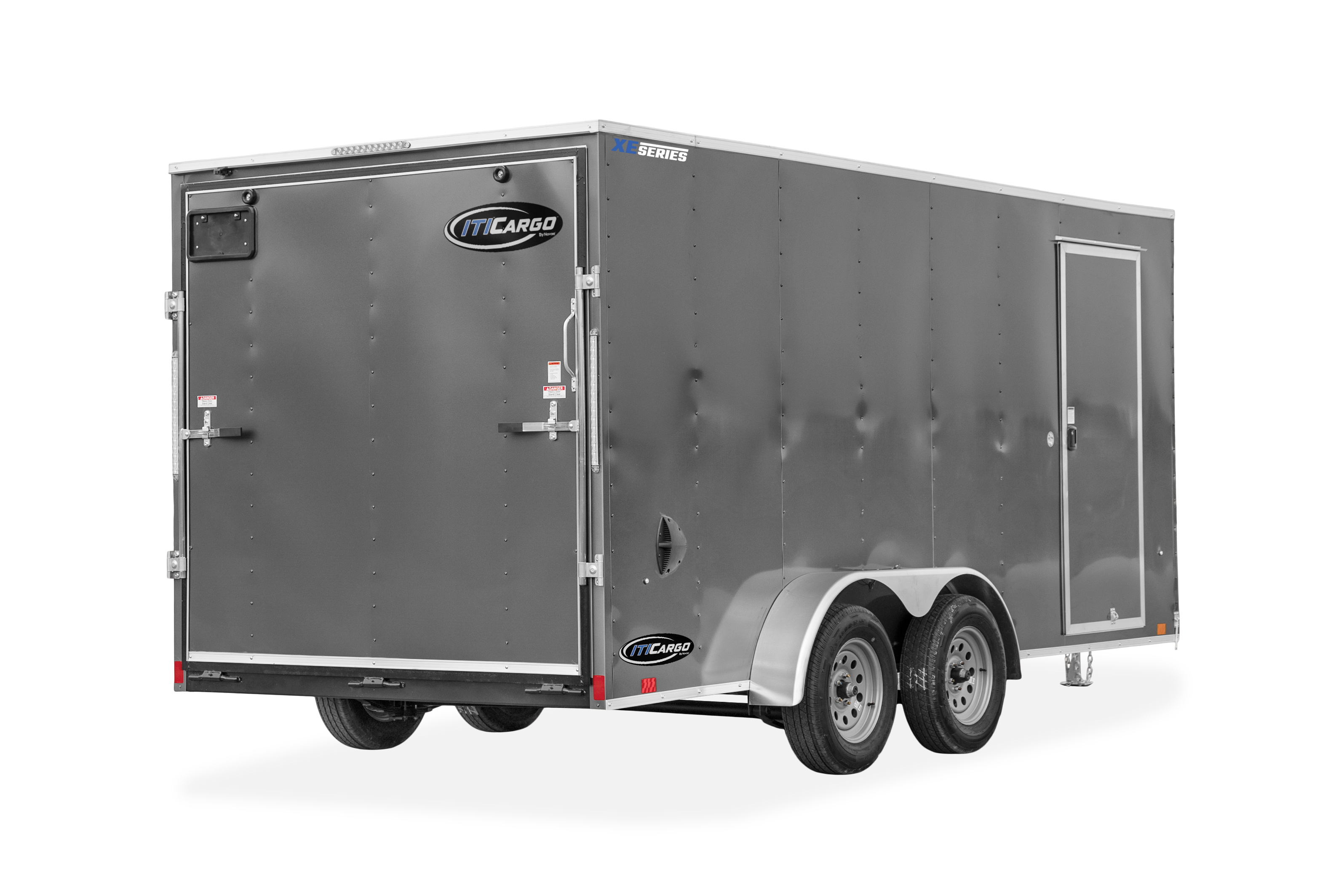 ITI Cargo Trailers | Products | Trailer Models | XE Cargo V-Nose Trailer | Image of grey enclosed cargo trailer with dual axles showing back right of trailer with fold down back door clear background